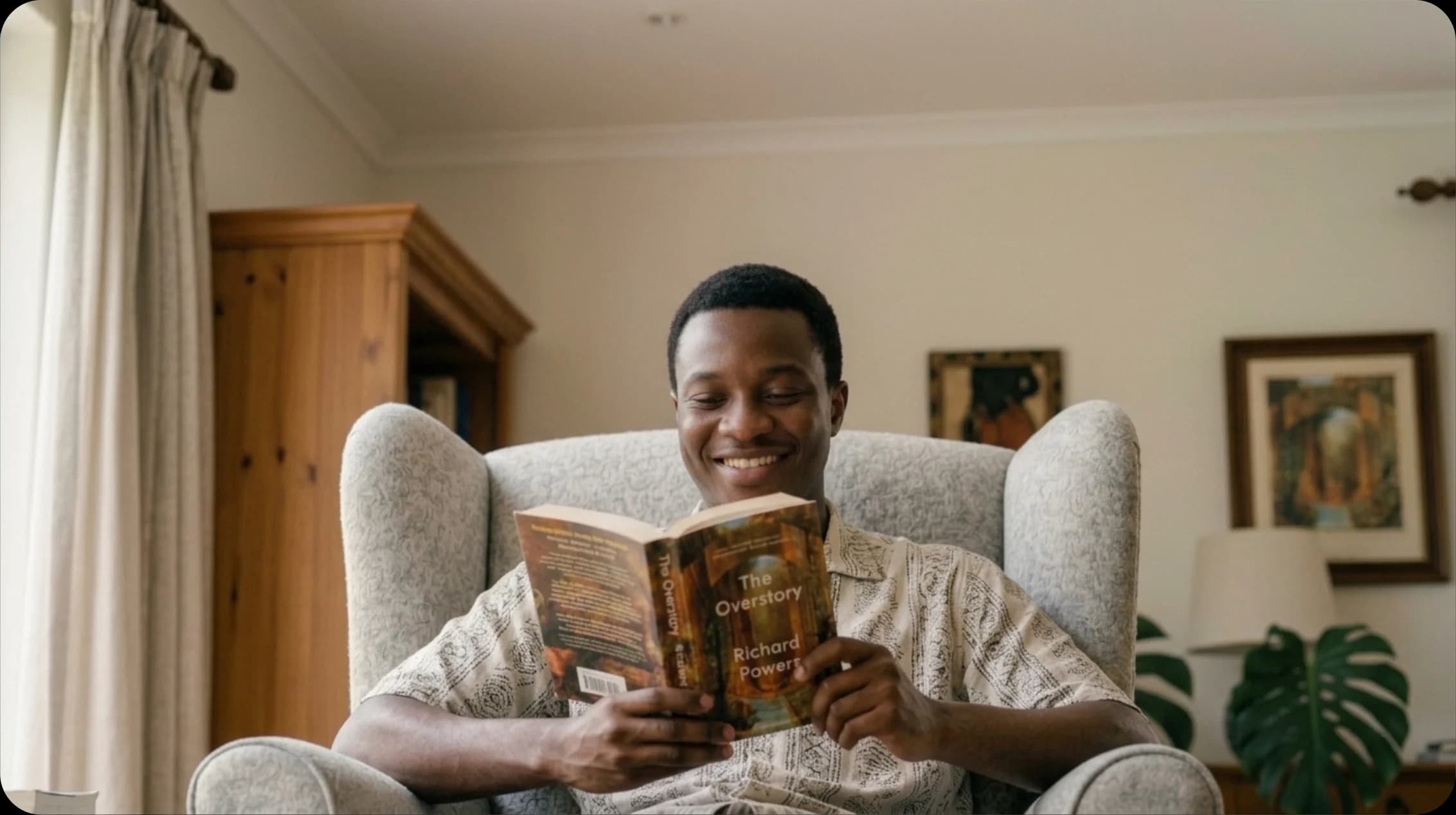 A man relaxing at home reading a book, supporting long-term brain health