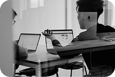 A member of an organization completing an assessment on a laptop